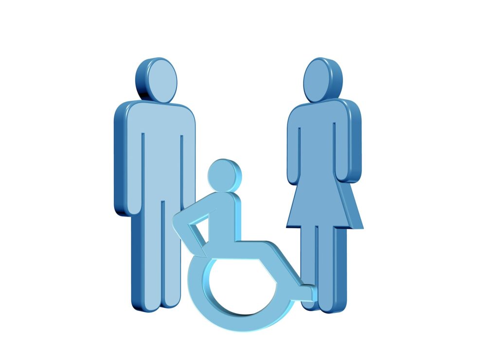 Obraz przedstawia postać człowieka poruszającegocą sie na wózku inwalidzkim oraz dwie postaci stojące obok.
